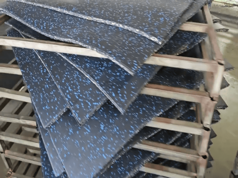 Applying a protective coating to rubber flooring